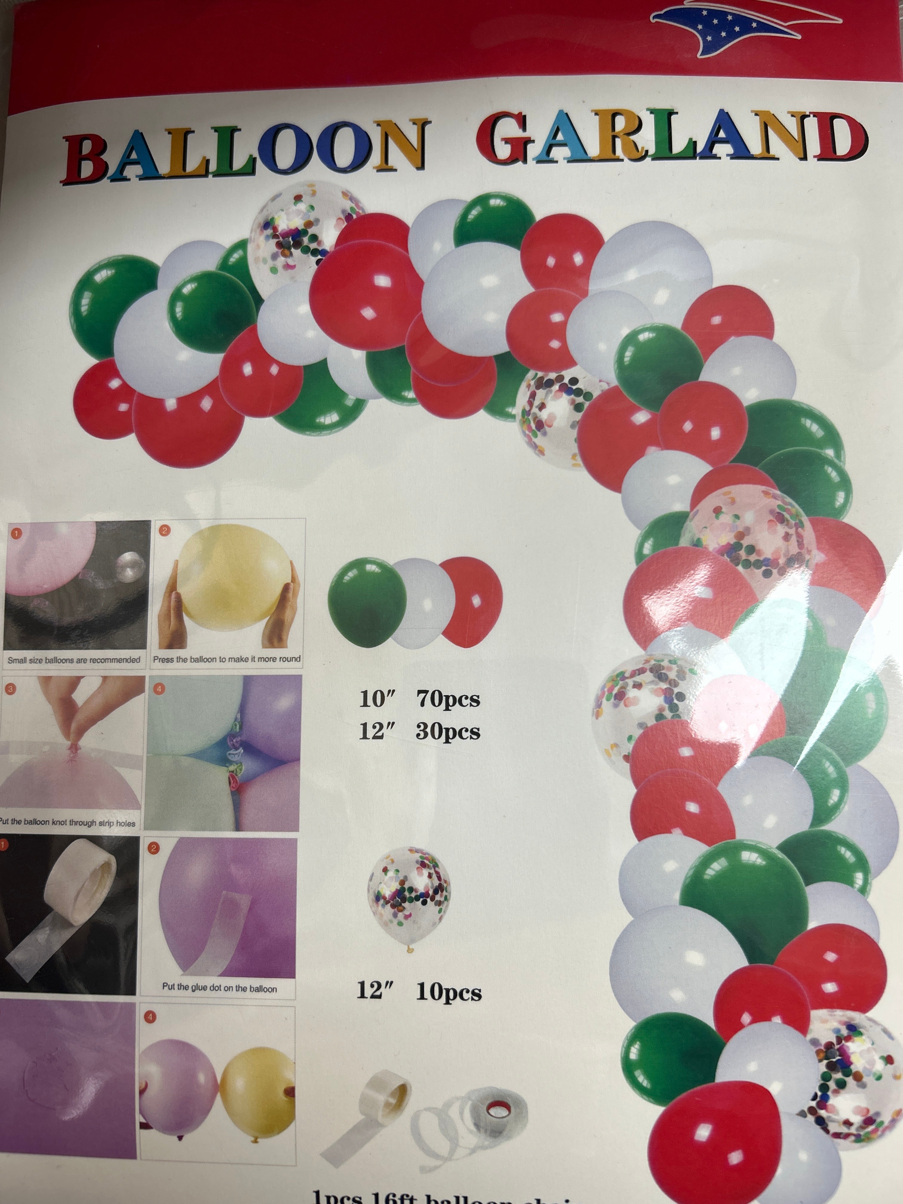 Red, white, and green balloon garland